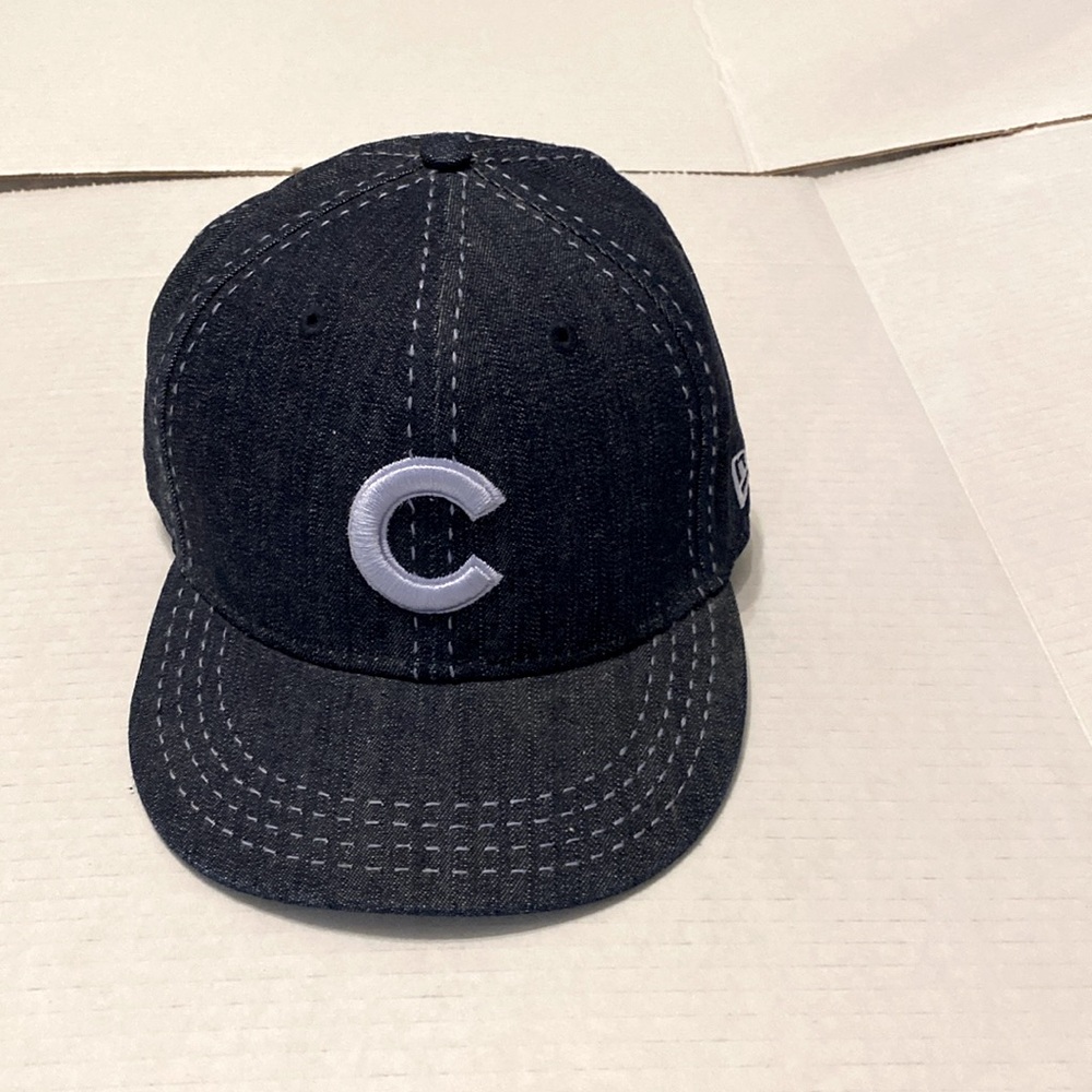 A black Chicago Cubs hat 🧢 it is in perfect condition and very affordable